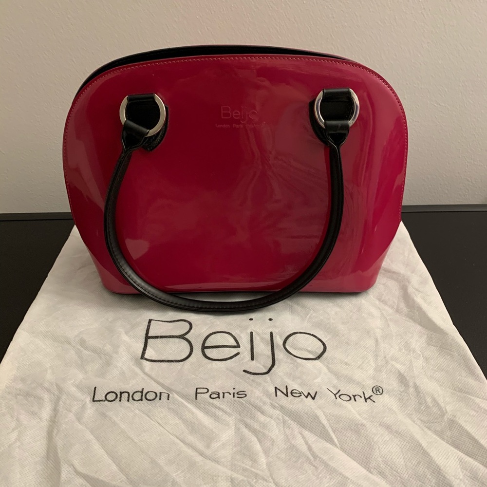 NWOT — Never used pink bag with dust bag